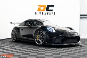 Win this GT3 RS Weissach & BMW M3 Touring or £260,000 Tax Free